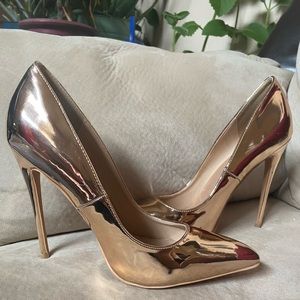 Women's metallic rose gold stiletto pumps